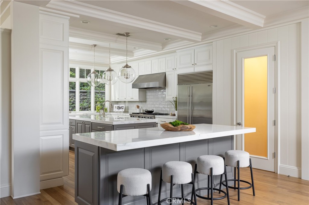56 Royal St George Road Newport Beach, CA 92660 - Photo 14 of 49 a kitchen with a sink cabinets and window