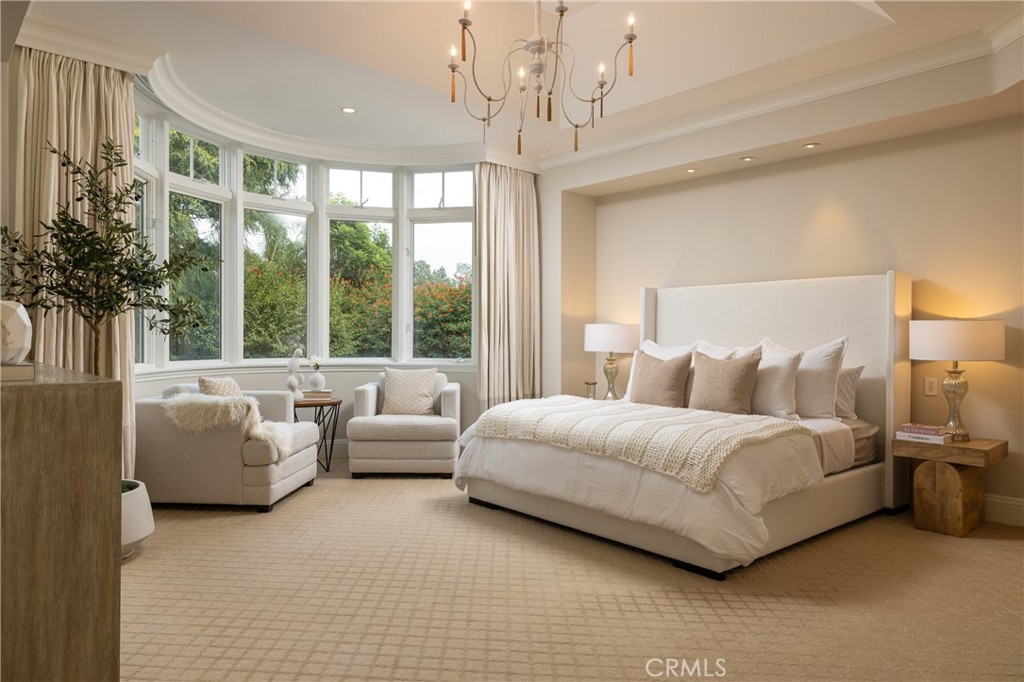 56 Royal St George Road Newport Beach, CA 92660 - Photo 21 of 49 a spacious bedroom with a bed and a couch