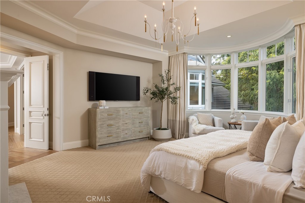 56 Royal St George Road Newport Beach, CA 92660 - Photo 22 of 49 a bedroom with a bed and a flat screen tv