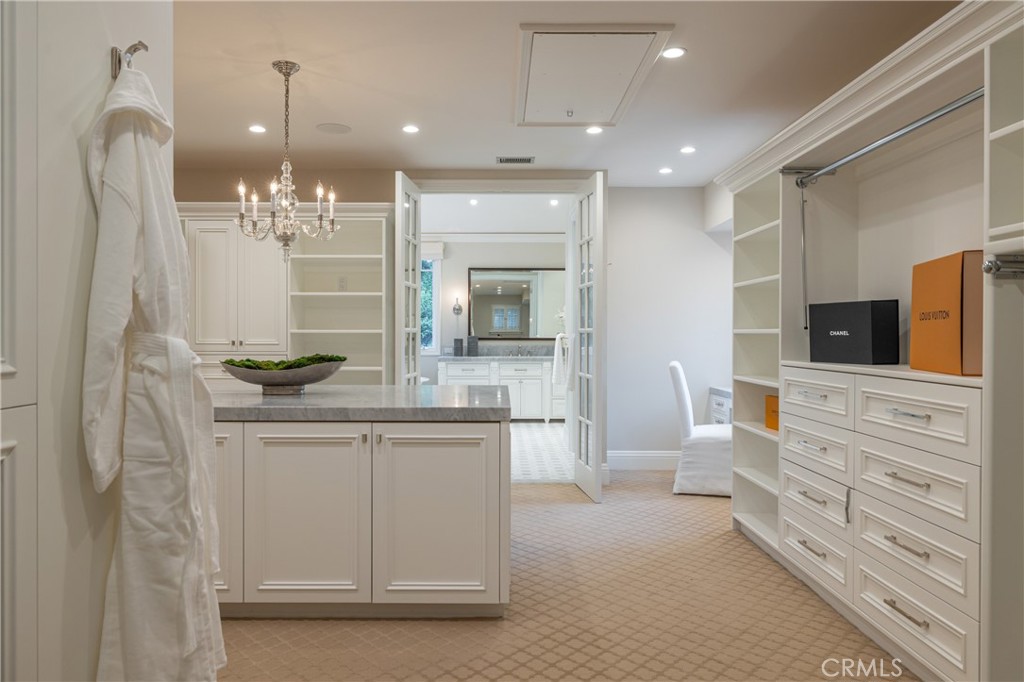 56 Royal St George Road Newport Beach, CA 92660 - Photo 24 of 49 a bathroom with double vanity and a mirror