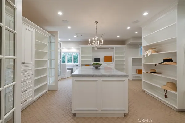 a view of living room with granite countertop furniture and flat screen tv
