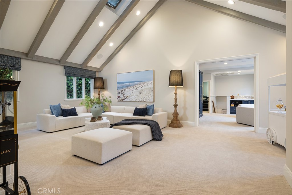 56 Royal St George Road Newport Beach, CA 92660 - Photo 29 of 49 a bedroom with furniture and a large mirror