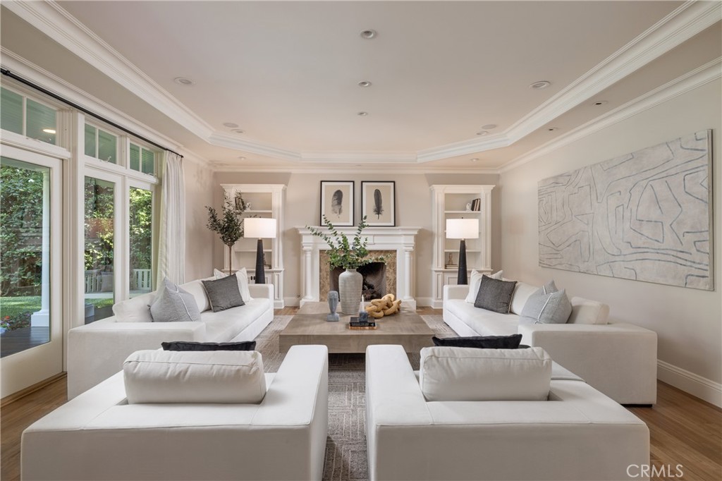 56 Royal St George Road Newport Beach, CA 92660 - Photo 6 of 49 a living room with fireplace furniture and a large window