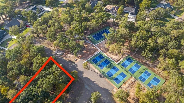 a view of a backyard with sitting area