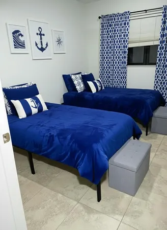 a bed room with a bed and a couch