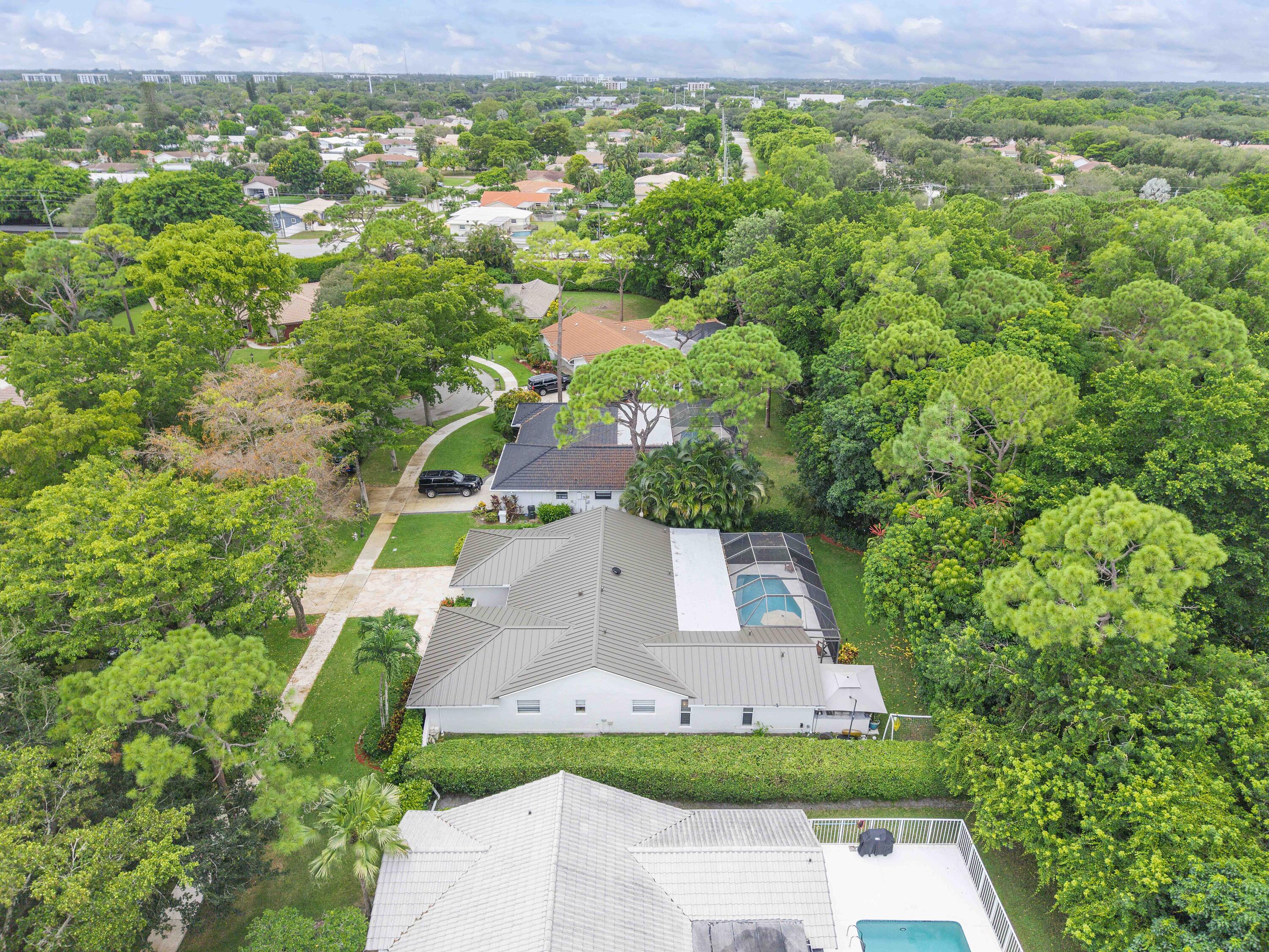 2421 Northwest 36th Street Boca Raton, FL 33431 - Photo 55 of 72 Drone Shot of House on Street