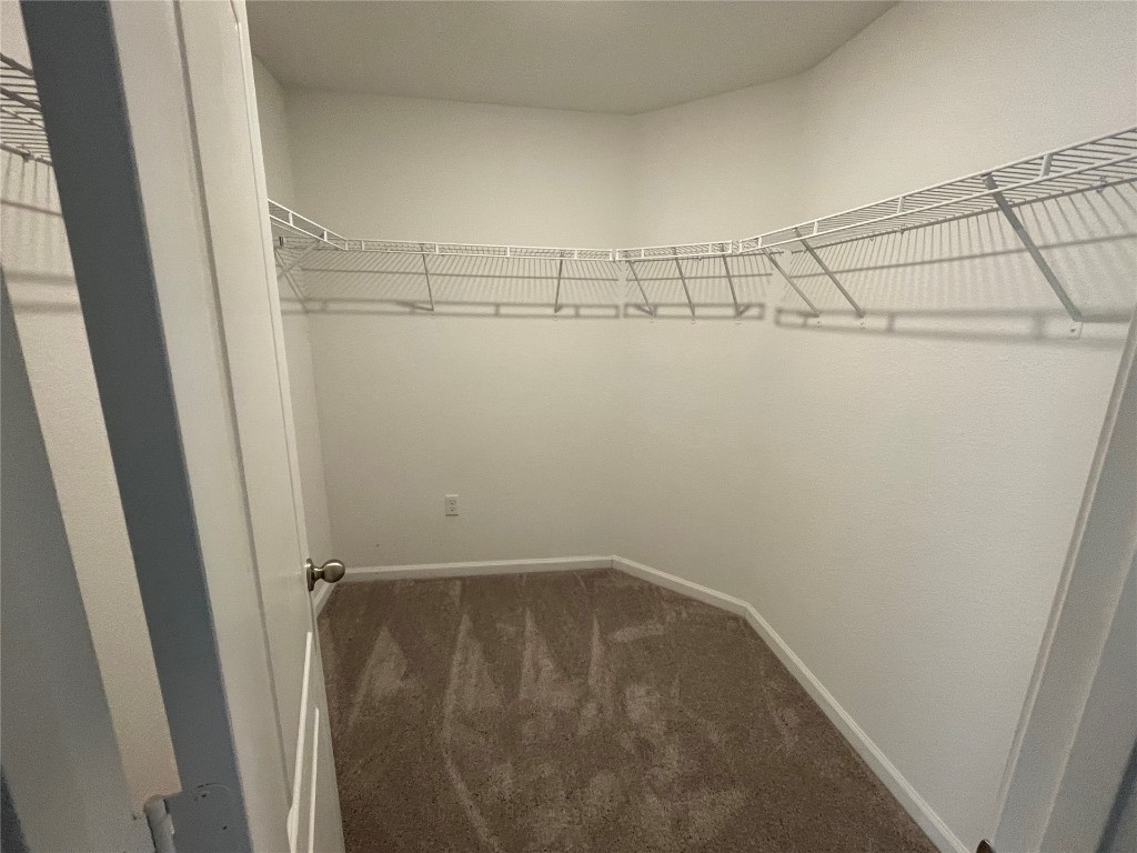 77444 Lumber Creek Boulevard Yulee, FL 32097 - Photo 14 of 24 a view of a room with racks on the wall