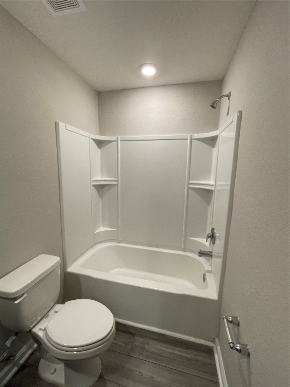 77444 Lumber Creek Boulevard Yulee, FL 32097 - Photo 22 of 24 a white toilet sitting next to a bath tub