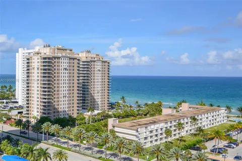 a view of a city with tall buildings