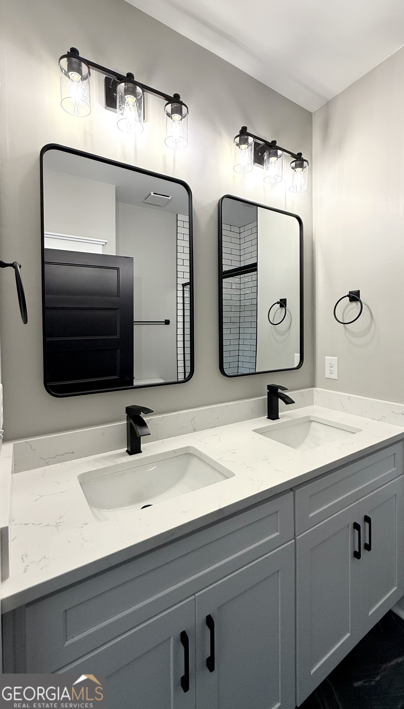 110 Sautee Ridge Road Clarkesville, GA 30523 - Photo 18 of 39 a bathroom with double vanity sink and mirror