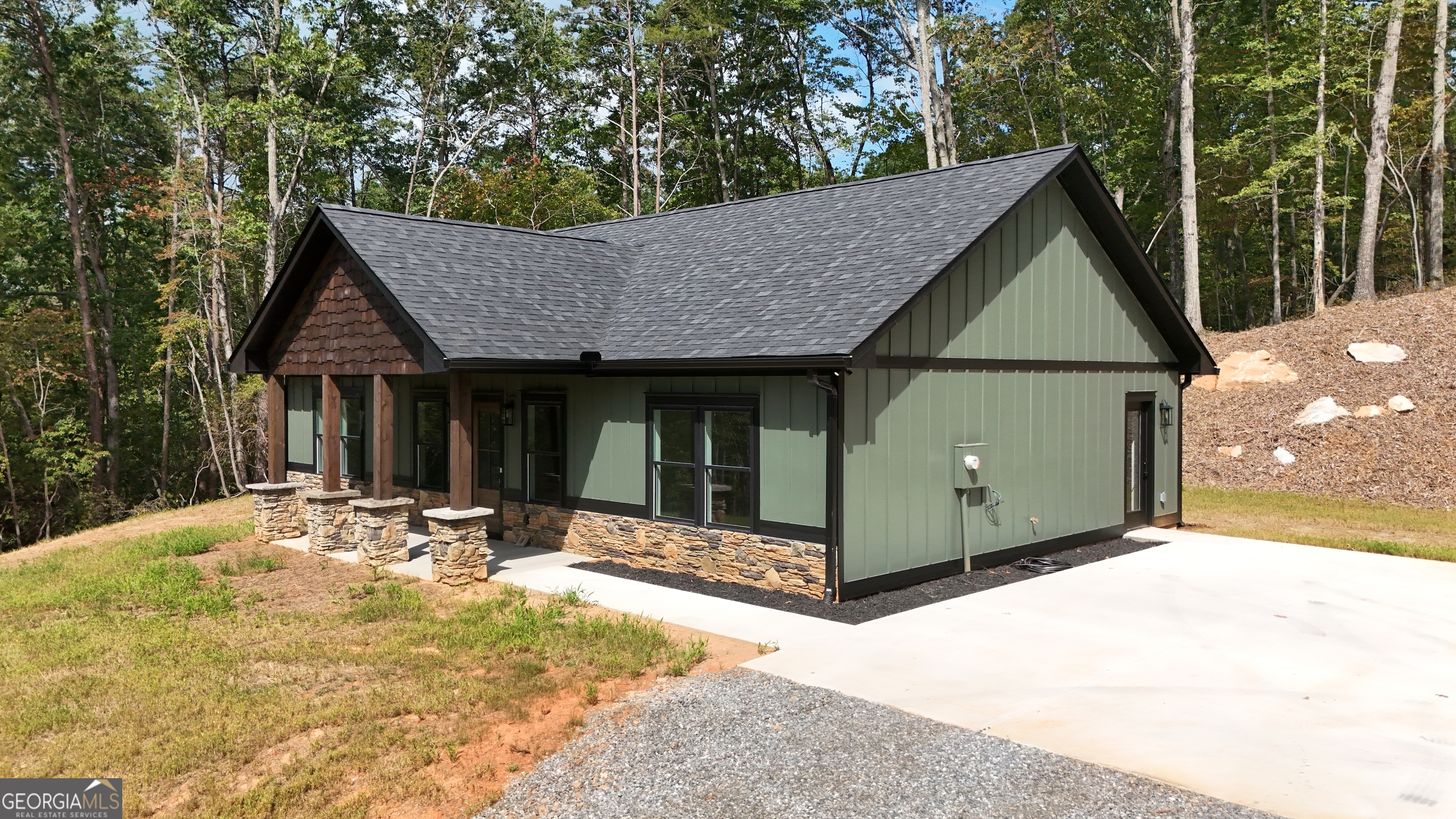 110 Sautee Ridge Road Clarkesville, GA 30523 - Photo 28 of 39 a view of a house with backyard and trees