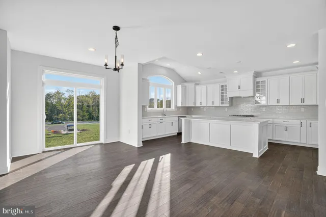 a kitchen with a sink and a window