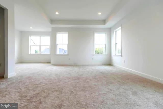 a view of a bathroom with sink and mirror
