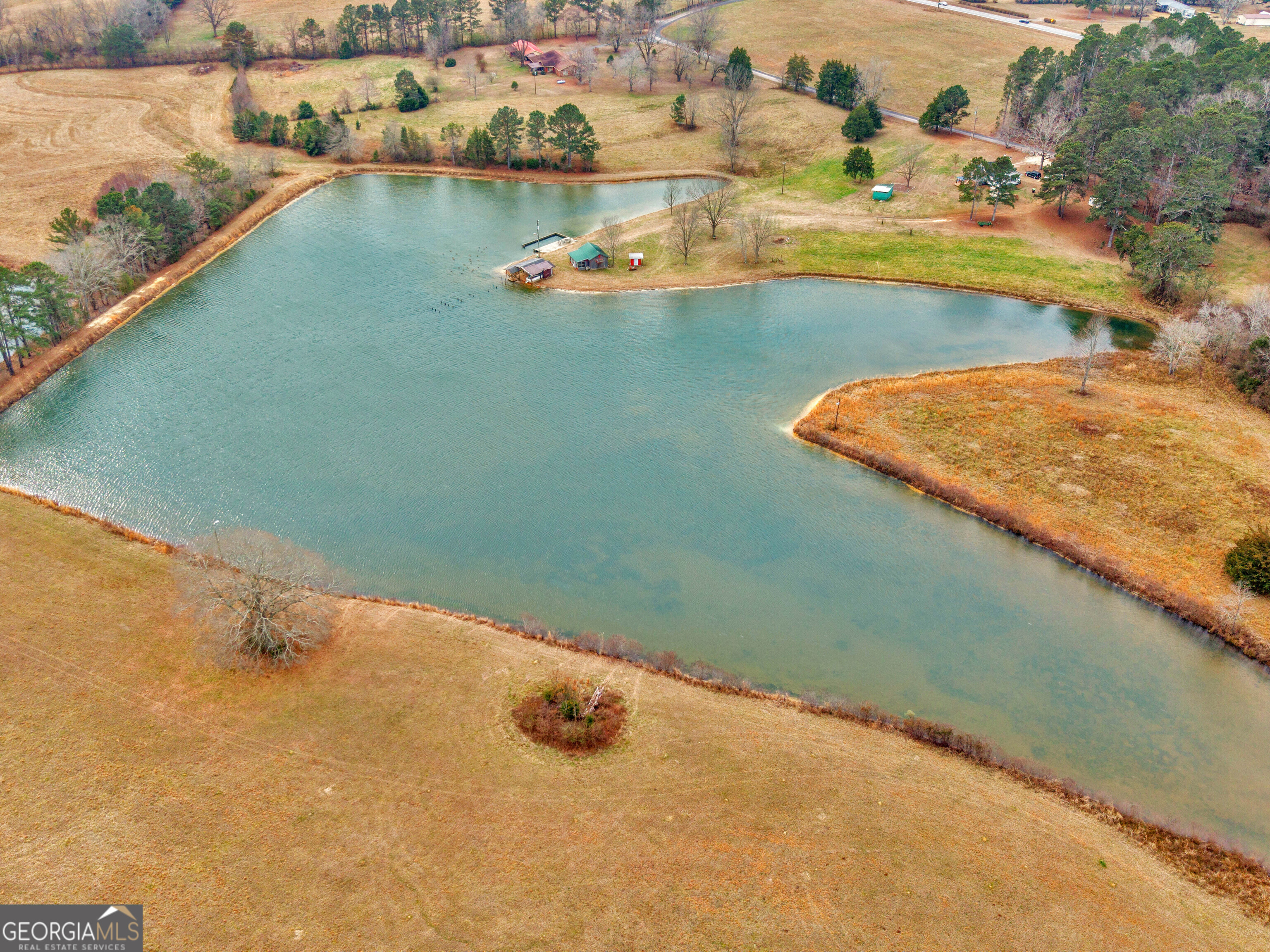 120 Ellerbee Lake Road Thomaston, GA 30286 - Photo 22 of 23 an aerial view of a house with a lake view