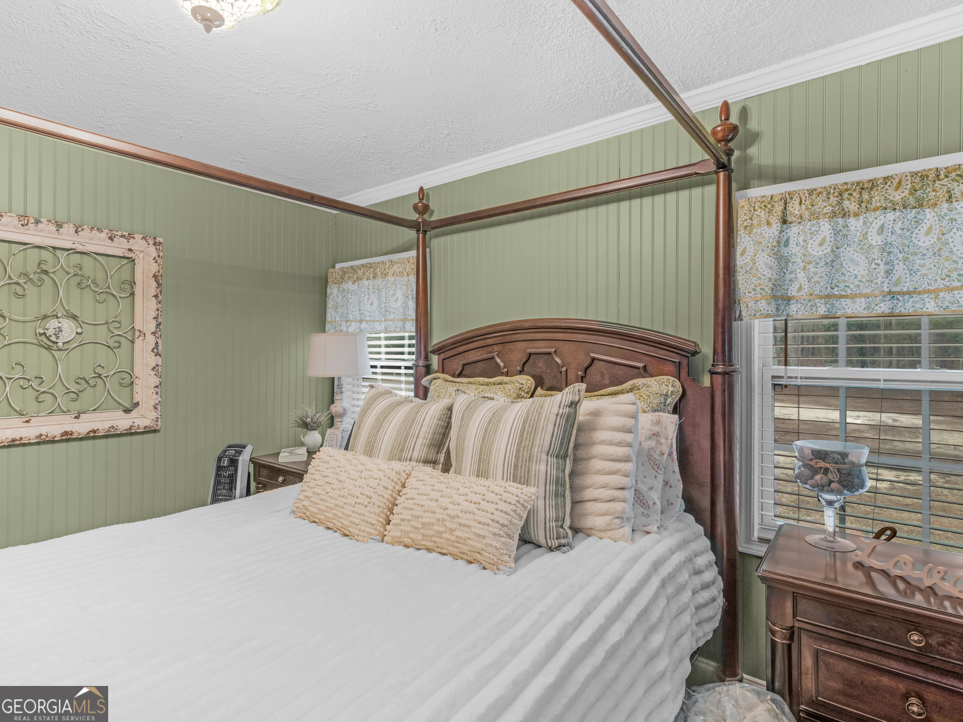 120 Ellerbee Lake Road Thomaston, GA 30286 - Photo 8 of 23 a bedroom with a bed and window