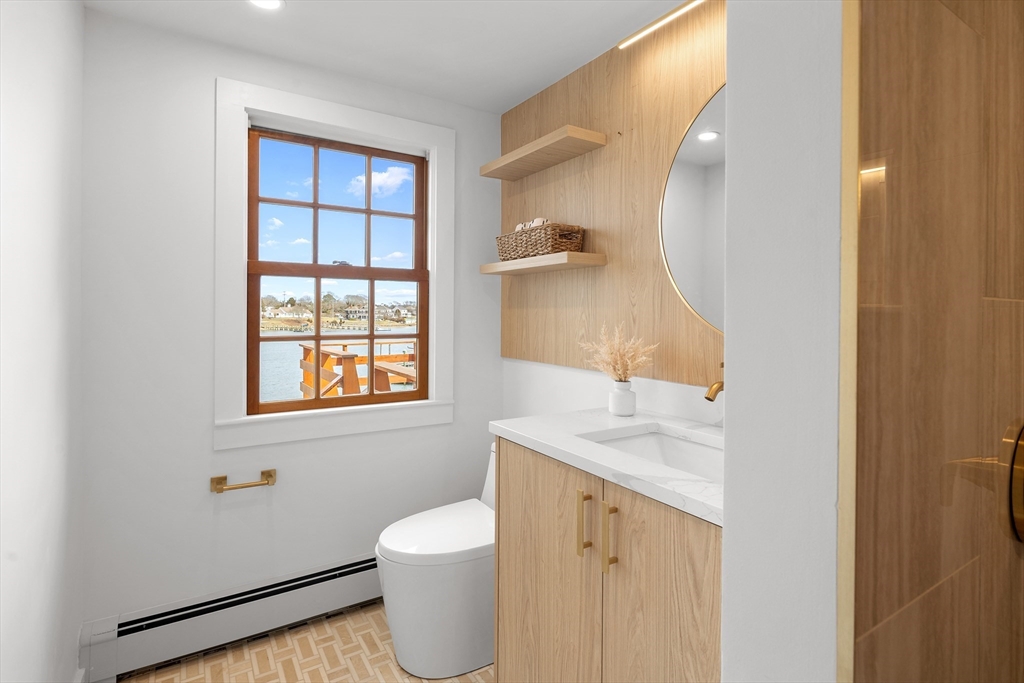 8 Pine Tree Drive Wareham, MA 02532 - Photo 17 of 35 a bathroom with a sink and a mirror