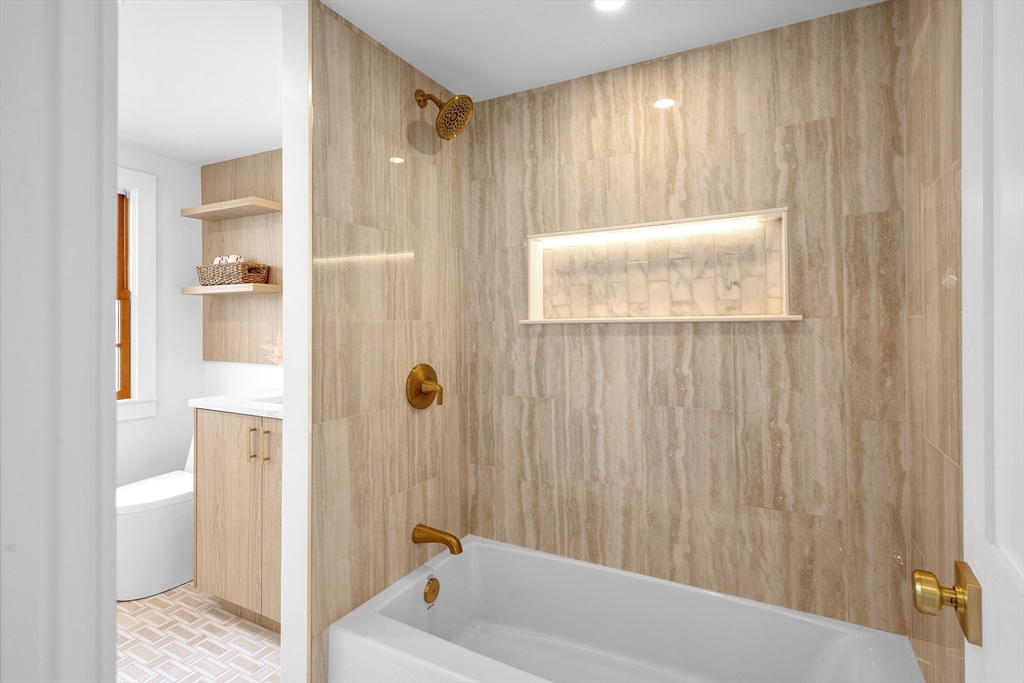 8 Pine Tree Drive Wareham, MA 02532 - Photo 18 of 35 a bathroom with a tub and shower