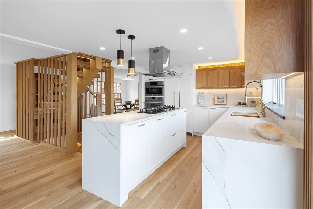 8 Pine Tree Drive Wareham, MA 02532 - Photo 4 of 35 a very nice looking room with a large kitchen counter space and stainless steel appliances