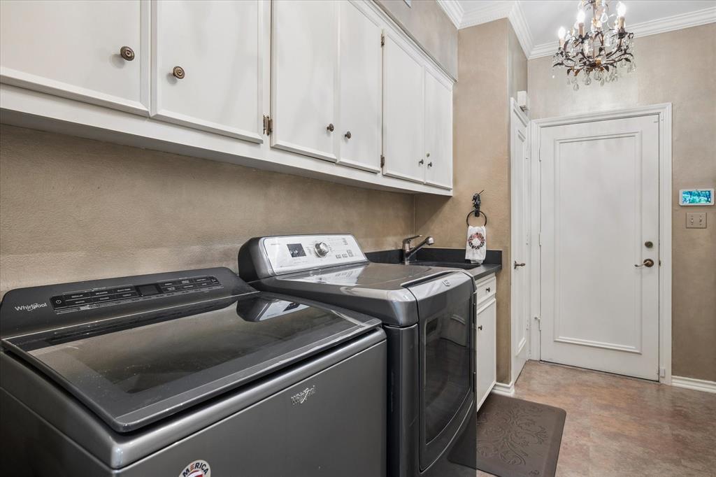 7276 Lupton Circle Dallas, TX 75225 - Photo 33 of 40 a close view of a stove top oven with granite countertops