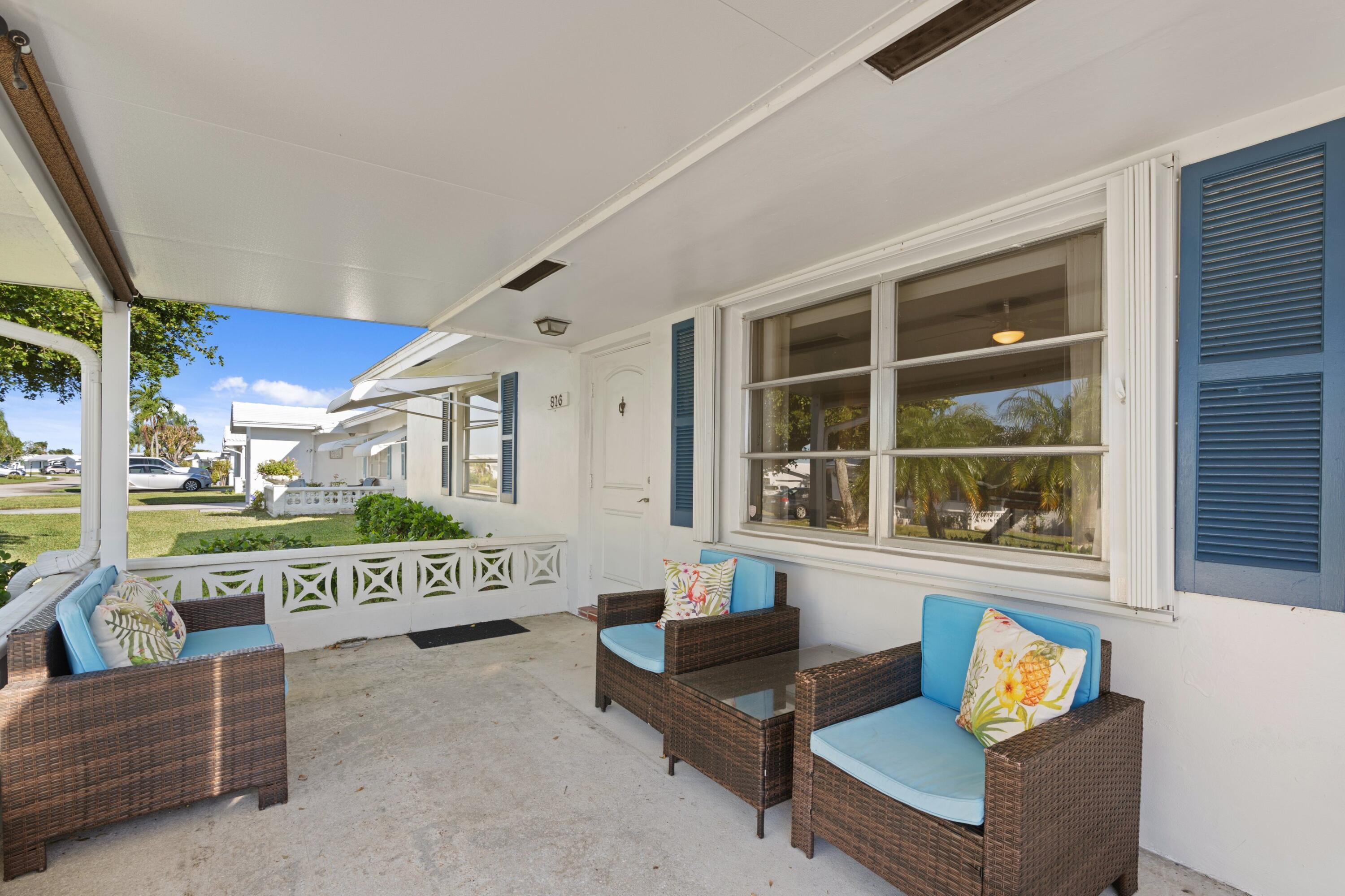 816 Southwest 18th Court Boynton Beach, FL 33426 - Photo 13 of 37 a living room with furniture and a window