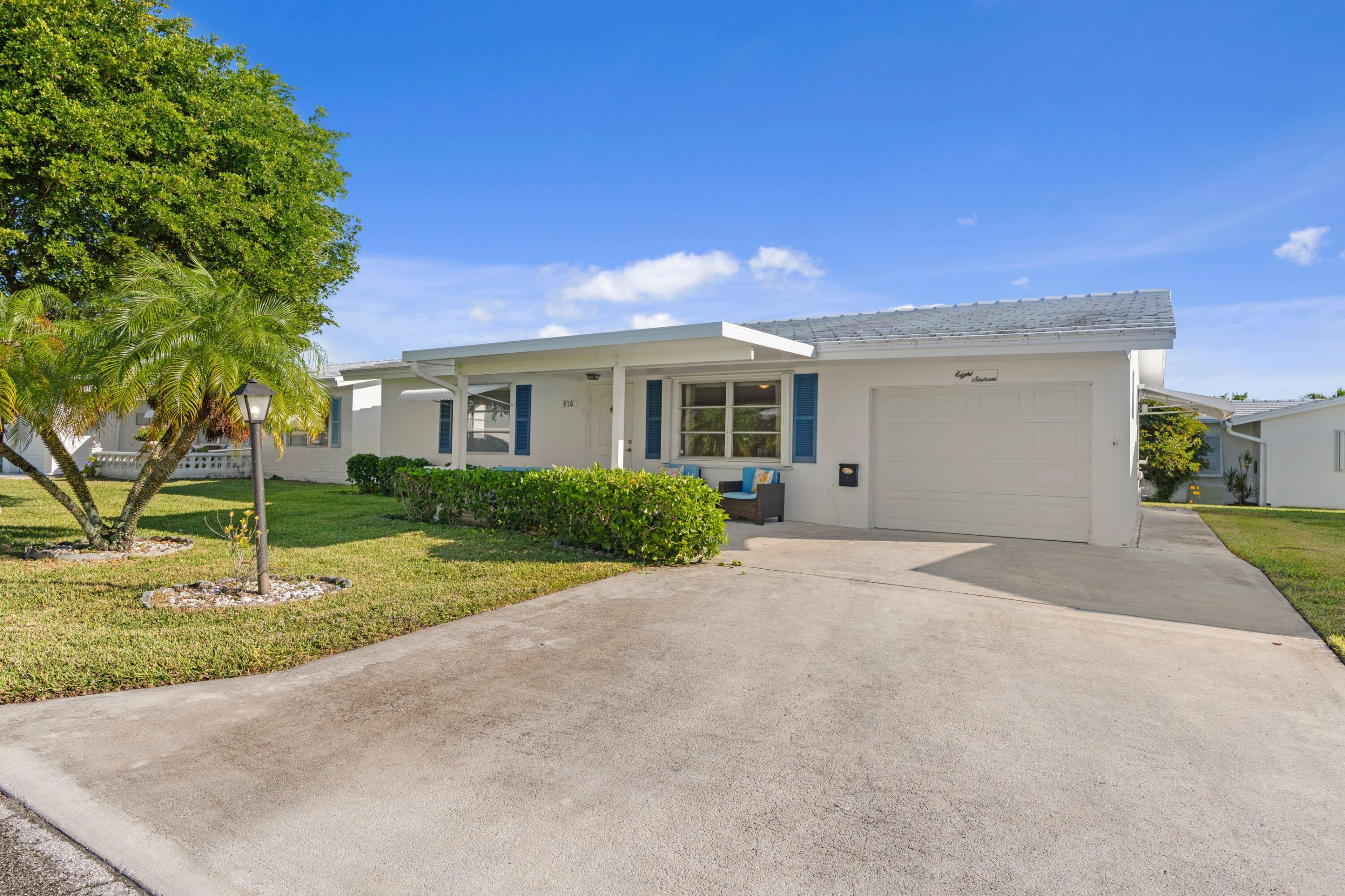 816 Southwest 18th Court Boynton Beach, FL 33426 - Photo 15 of 37 a view of backyard of a house