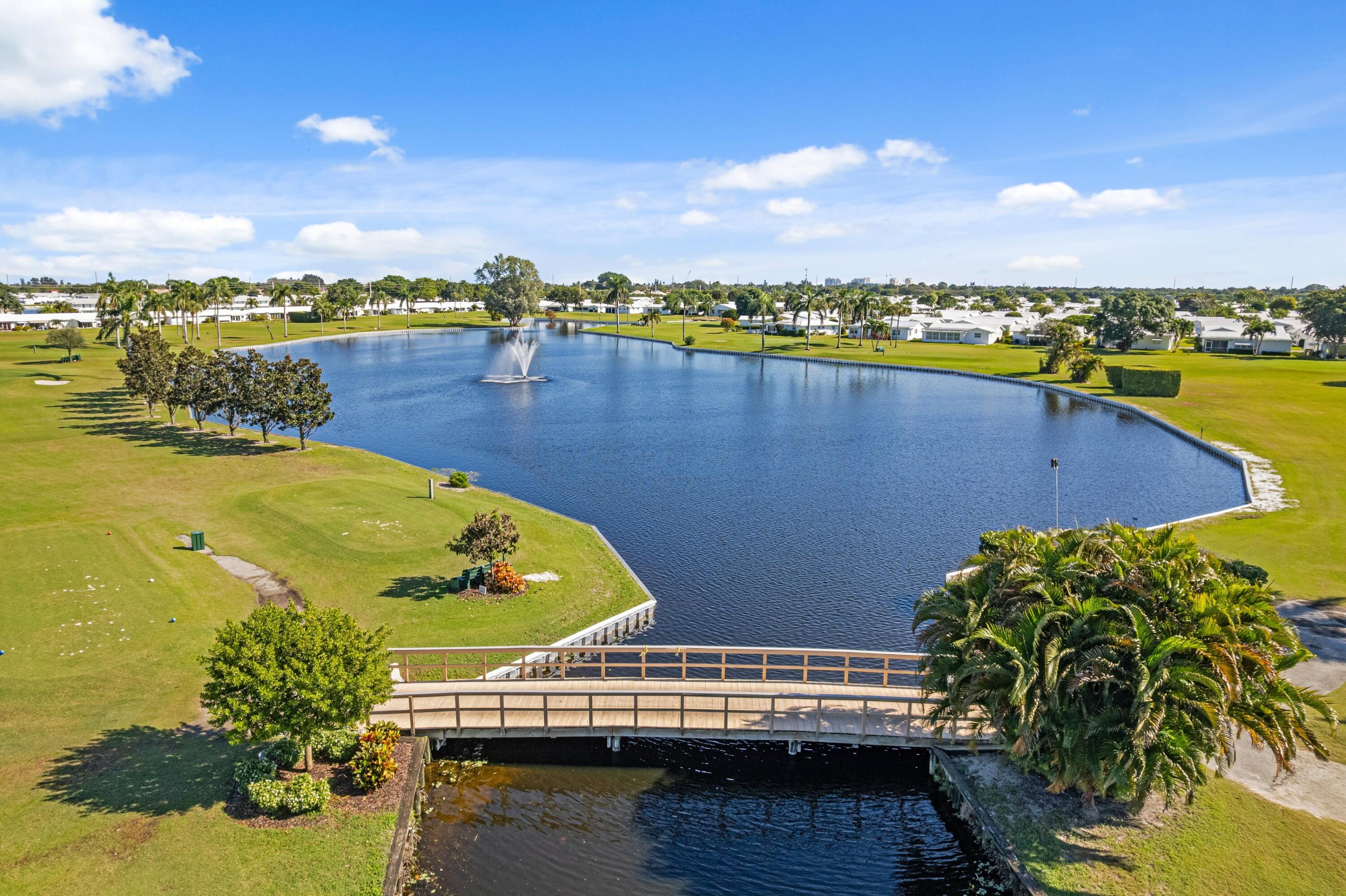 816 Southwest 18th Court Boynton Beach, FL 33426 - Photo 16 of 37 a view of a lake with a outdoor space