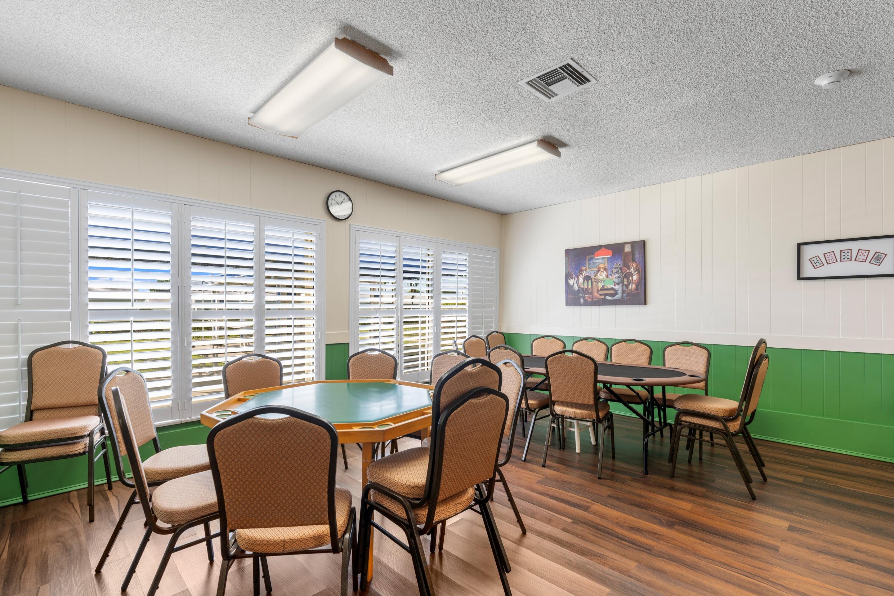 816 Southwest 18th Court Boynton Beach, FL 33426 - Photo 28 of 37 a view of a dining room with furniture and wooden floor