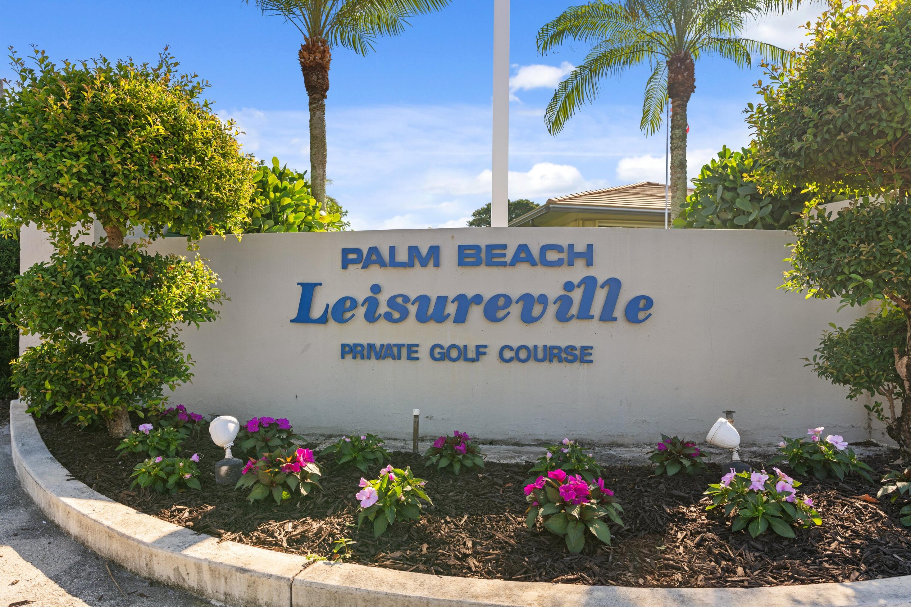 816 Southwest 18th Court Boynton Beach, FL 33426 - Photo 30 of 37 a sign that is in front of flowers