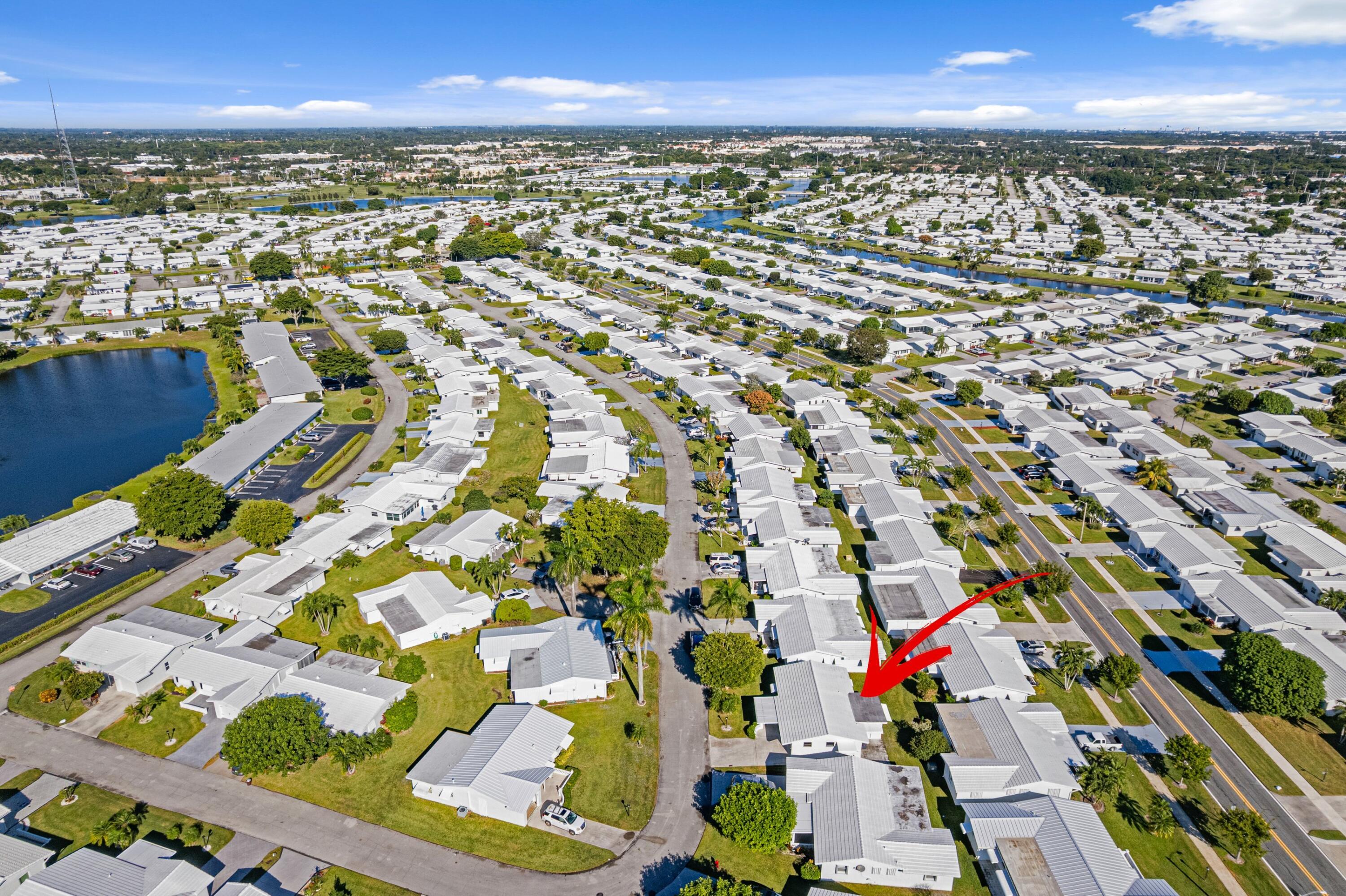 816 Southwest 18th Court Boynton Beach, FL 33426 - Photo 32 of 37 an aerial view of residential houses with outdoor space