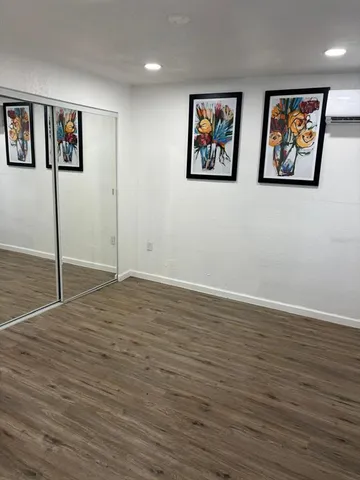 a white refrigerator freezer sitting inside of a kitchen