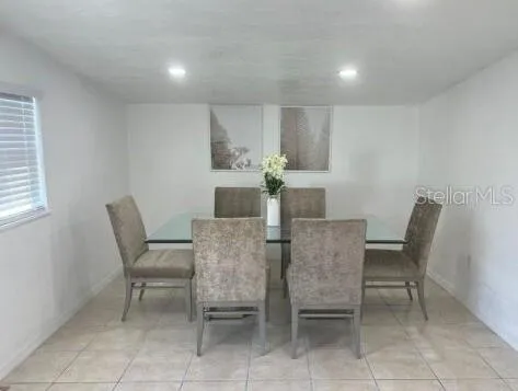 a view of a livingroom with furniture and a livingroom