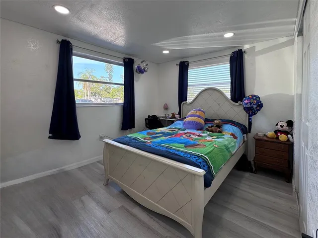 a view of a bathroom with a sink and mirror