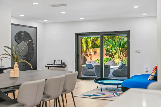 a view of a workspace with furniture