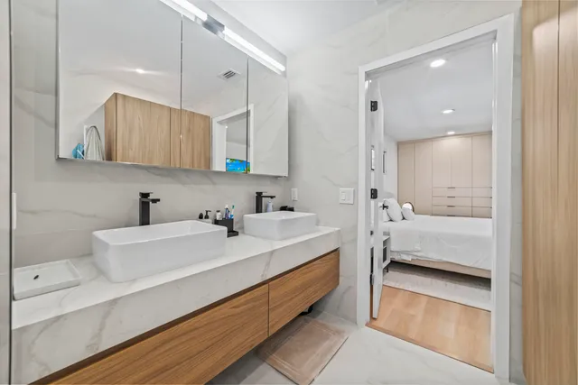 a bathroom with a toilet a sink and bathtub