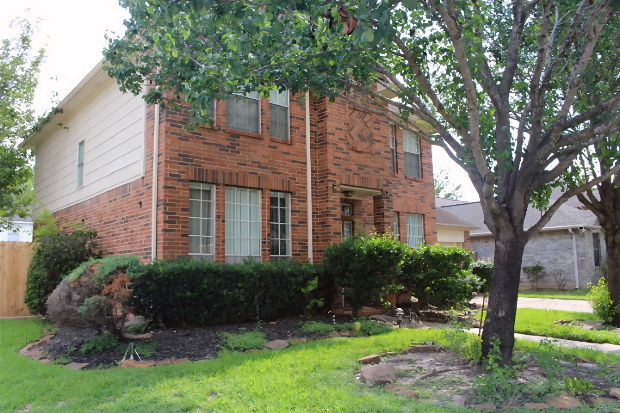 4103 Sablemist Court Houston, TX 77014 - Photo 28 of 29 a view of a house with a tree in a yard