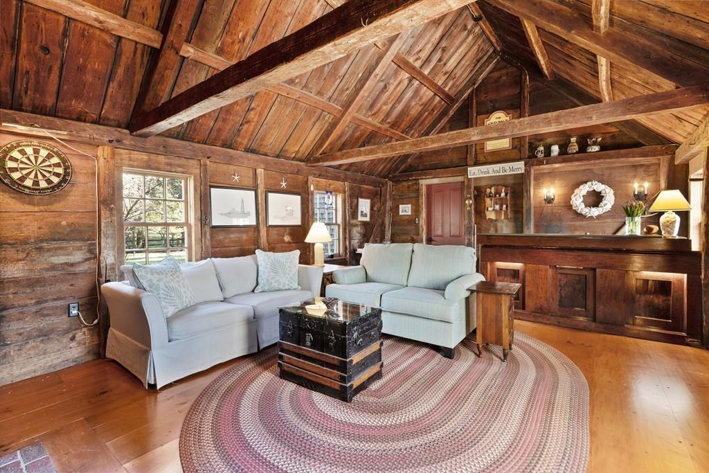 220 Prospect Street Hingham, MA 02043 - Photo 14 of 41 a living room with furniture and a fireplace