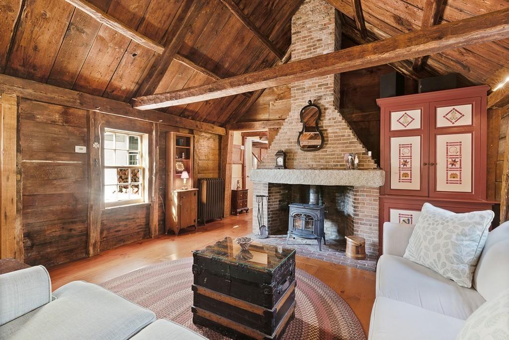 220 Prospect Street Hingham, MA 02043 - Photo 16 of 41 a living room with furniture and a fireplace