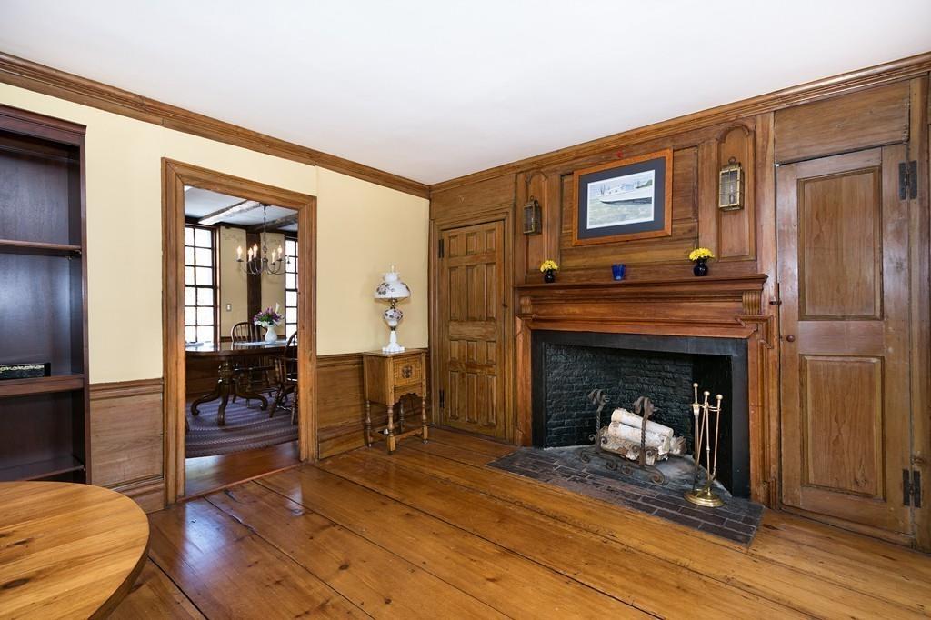 220 Prospect Street Hingham, MA 02043 - Photo 17 of 41 a living room with furniture and a fireplace