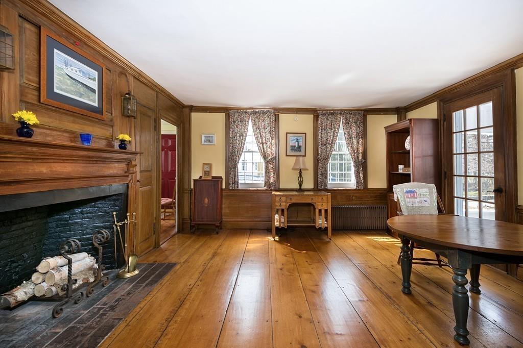 220 Prospect Street Hingham, MA 02043 - Photo 18 of 41 a living room with furniture and a fireplace
