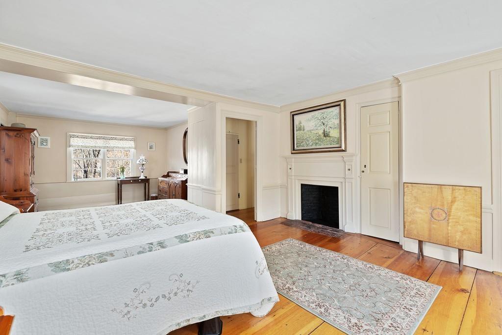 220 Prospect Street Hingham, MA 02043 - Photo 21 of 41 a living room with fireplace furniture and a rug