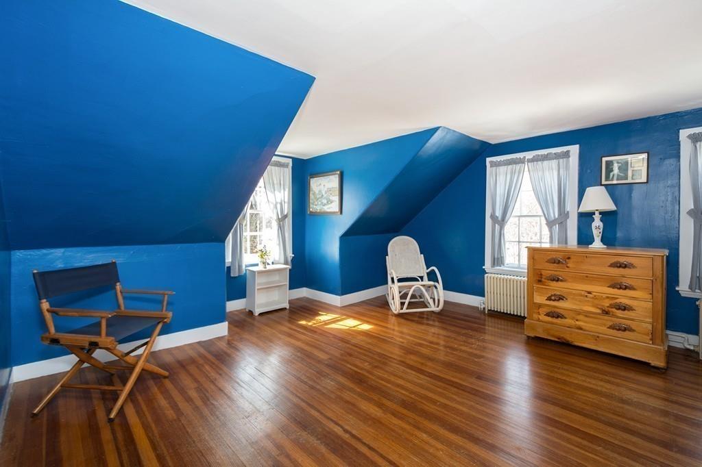 220 Prospect Street Hingham, MA 02043 - Photo 24 of 41 a room with furniture and a chair