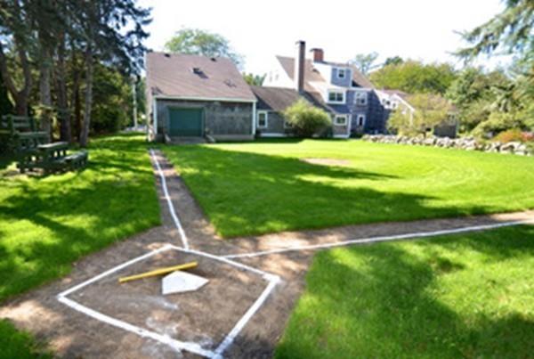220 Prospect Street Hingham, MA 02043 - Photo 27 of 41 a view of a house with a yard and a large tree