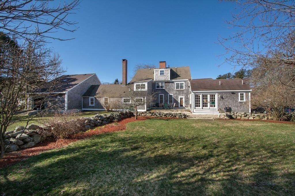 220 Prospect Street Hingham, MA 02043 - Photo 29 of 41 a front view of a house with a yard