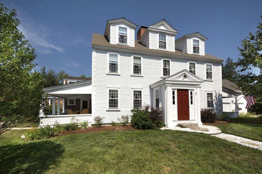 220 Prospect Street Hingham, MA 02043 - Photo 31 of 41 a front view of a house with a yard