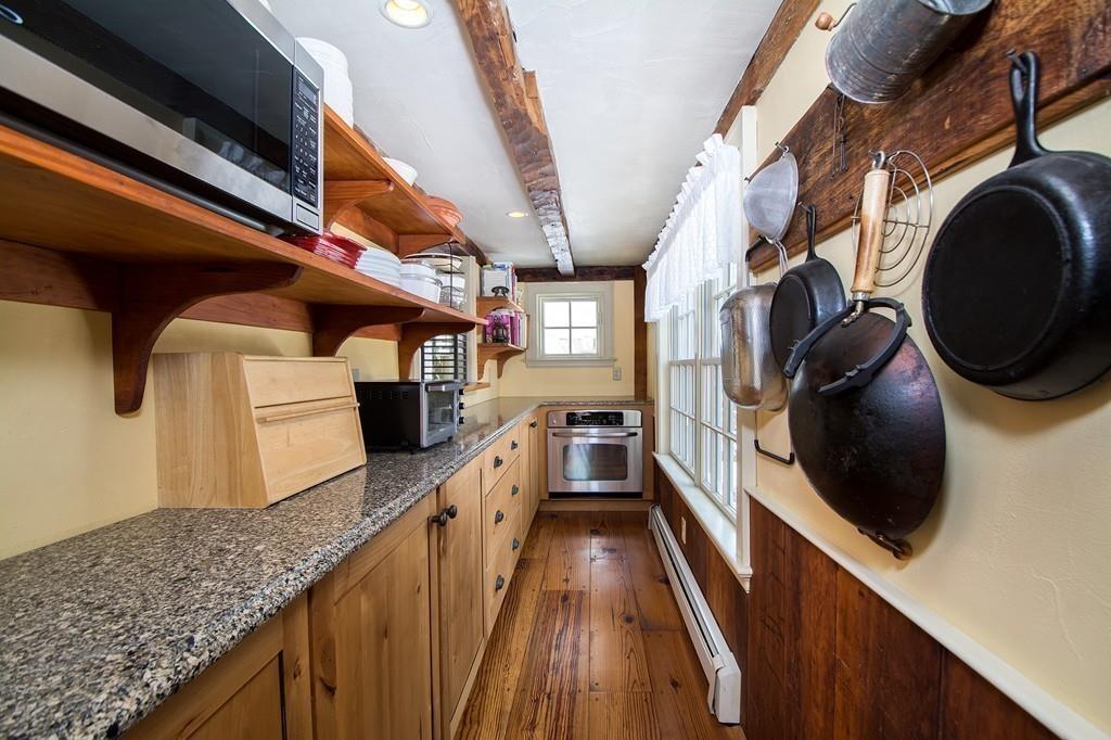 220 Prospect Street Hingham, MA 02043 - Photo 8 of 41 a view of a kitchen with a sink and dishwasher