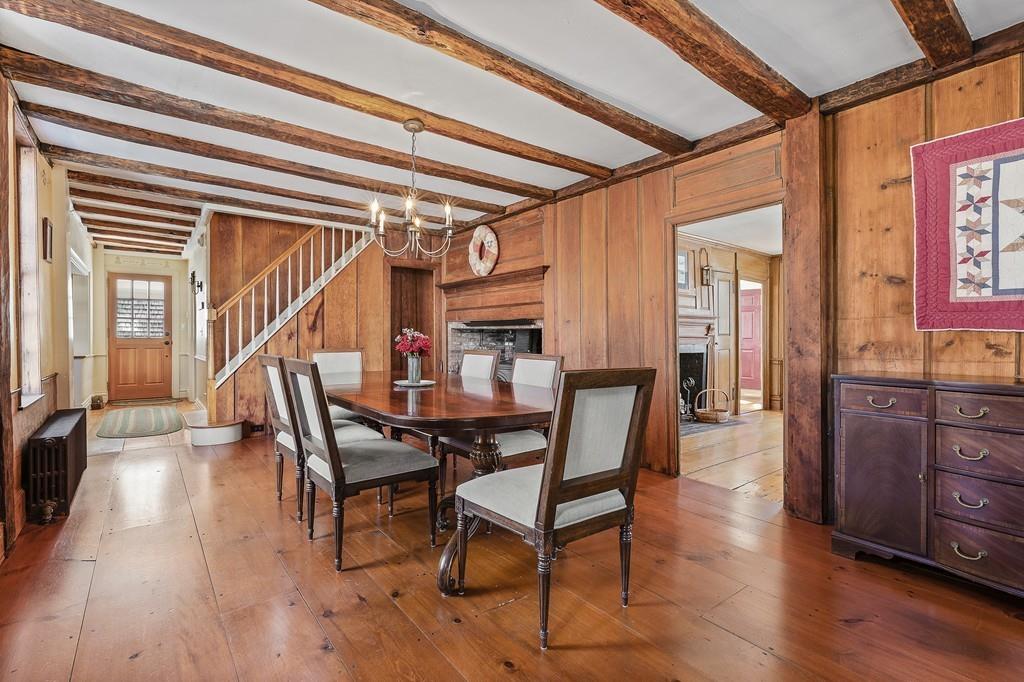 220 Prospect Street Hingham, MA 02043 - Photo 9 of 41 a dining room with wooden floor table and chairs