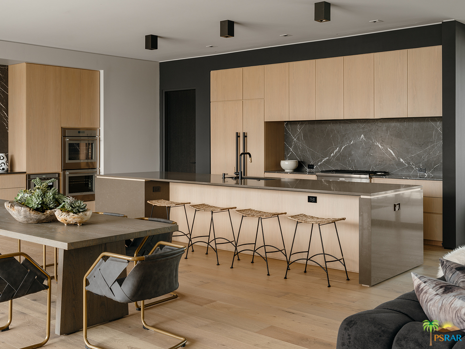 2 Echo Lane Rancho Mirage, CA 92270 - Photo 19 of 40 a kitchen with a table and chairs