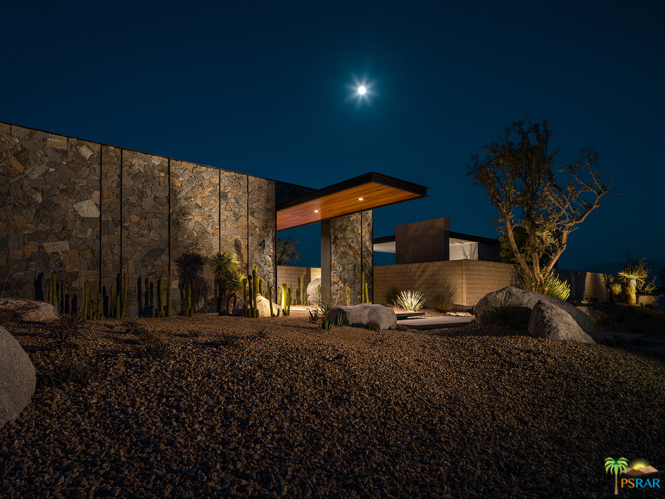 2 Echo Lane Rancho Mirage, CA 92270 - Photo 20 of 40 a front view of a house with a yard