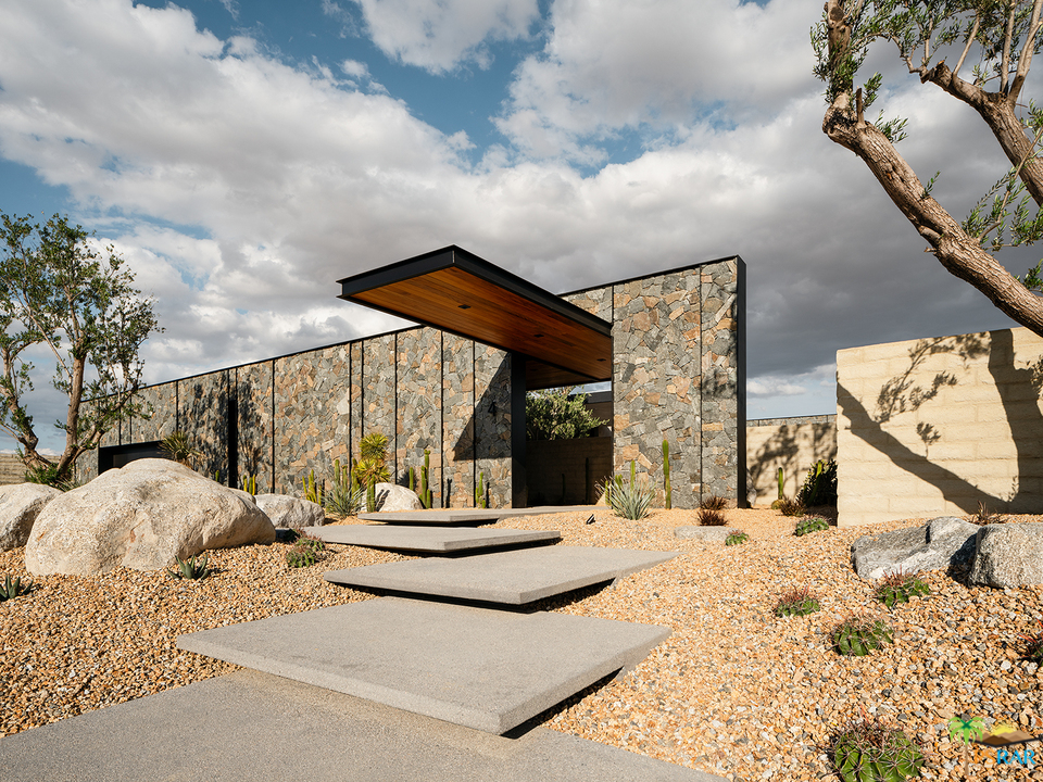 2 Echo Lane Rancho Mirage, CA 92270 - Photo 25 of 40 a view of roof deck with a barbeque and wooden floor