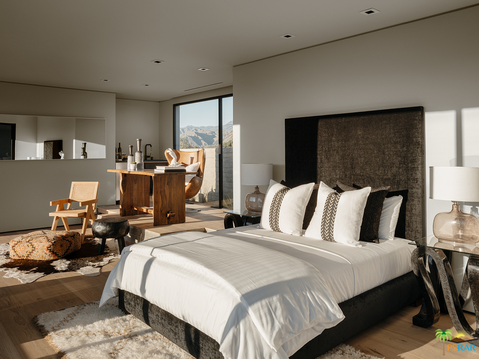 2 Echo Lane Rancho Mirage, CA 92270 - Photo 29 of 40 a bed room with bed and large window